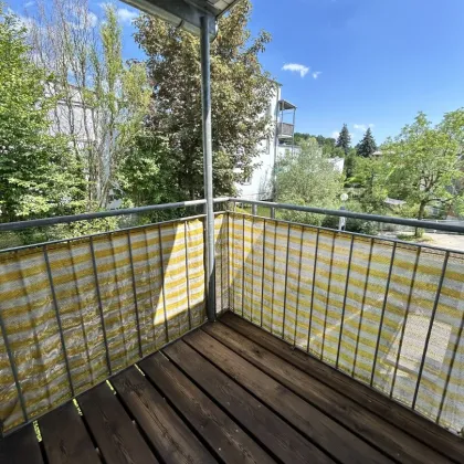 Ein echtes Raumwunder mit Charme – 3 Zimmer, 2 Balkone & Tiefgarage! - Bild 2