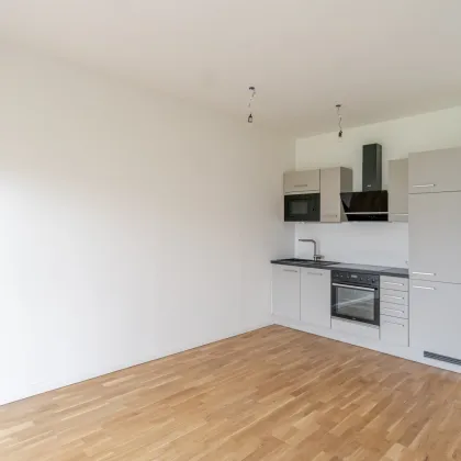 Helle 2-Zimmer-Wohnung mit großzügiger Terrasse und Tiefgaragenparkplatz - Bild 3