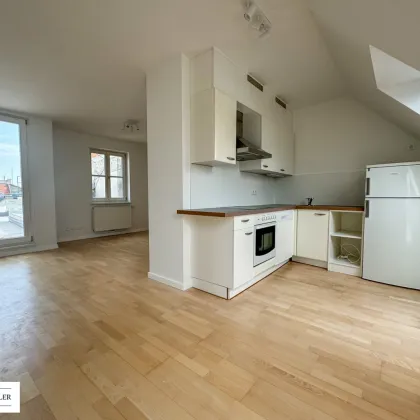 Traumblick! Urbanes Wohnen– 1,5-Zimmer-Juwel im 7. Bezirk mit riesiger Dachterrasse - Bild 2