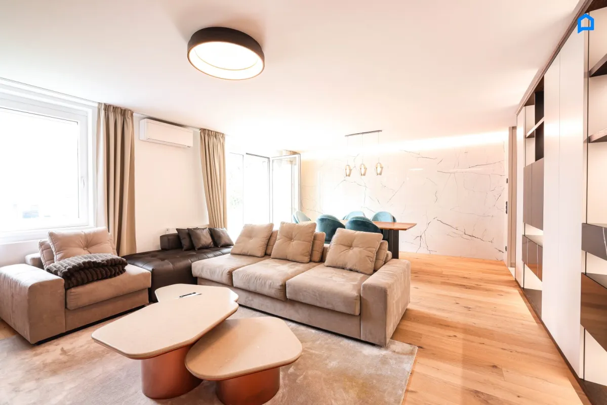 Exklusives Wohnen in Grünruhelage – Stilvolle Luxuswohnung in hochwertigster Ausstattung mit Balkon in 1110 Wien (Kaiser-Ebersdorf) optionale Tiefgarage - Bild 1