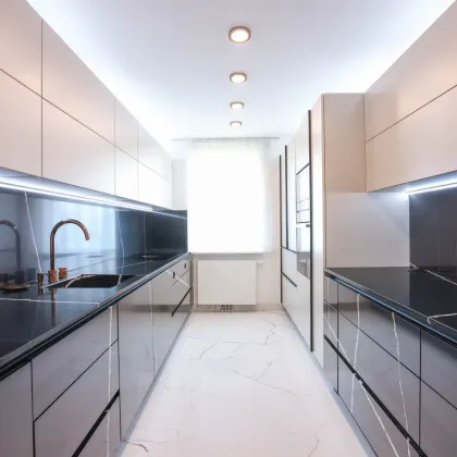 Exklusives Wohnen in Grünruhelage – Stilvolle Luxuswohnung in hochwertigster Ausstattung mit Balkon in 1110 Wien (Kaiser-Ebersdorf) optionale Tiefgarage - Bild 3