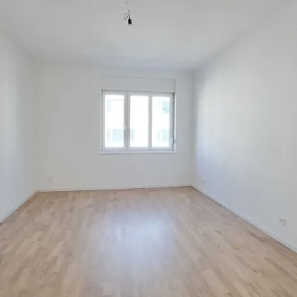 Erstbezug mit Balkon und Garten! - Bild 2