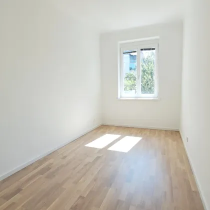 Erstbezug mit Balkon und Garten! - Bild 3