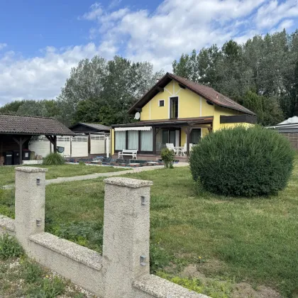 Charmantes Einfamilienhaus mit Pool auf Pachtgrund in ruhiger Donau-Lage - Bild 2