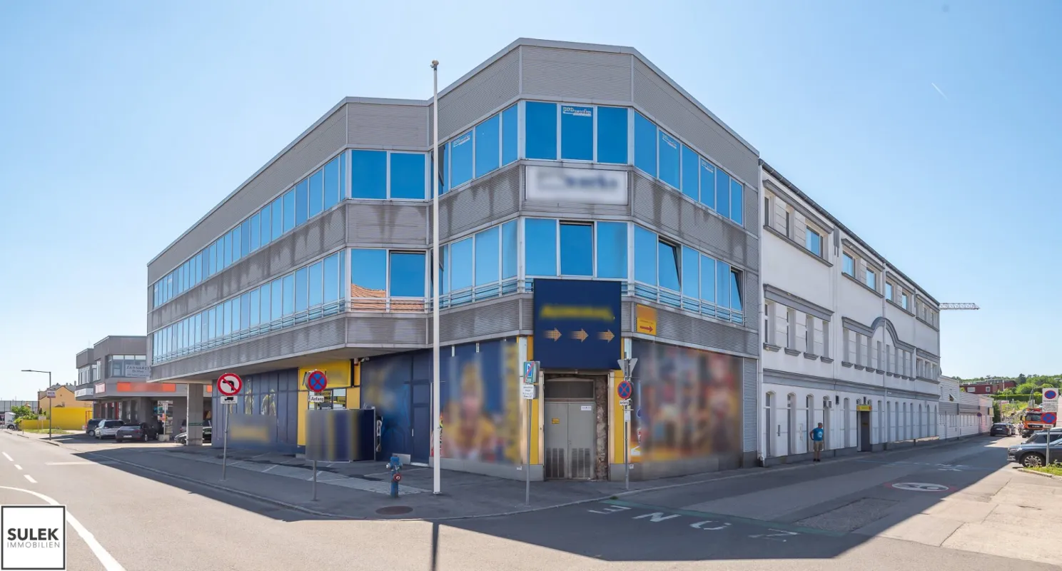Grundstück mit vier Baukörpern - Büro-, Geschäfts- und Gewerbegebäude inkl. Parkplätzen in Vösendorf - Bild 1