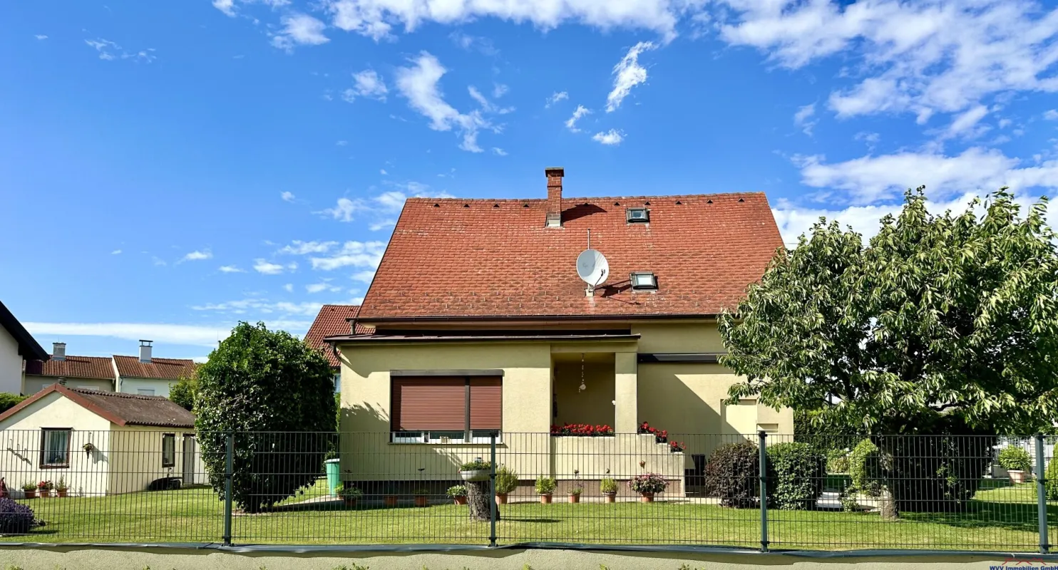 Wohnen im Grünen – liebevoll saniertes Familienhaus mit Traumgarten und viel Platz zum Leben in der schönen Invalidensiedlung - Bild 1