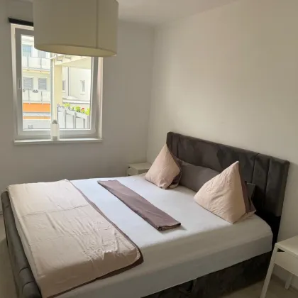 Moderne Wohnung in Vösendorf: 61m² mit Balkon, Einbauküche & Badewanne! € 340.000,- - Bild 2