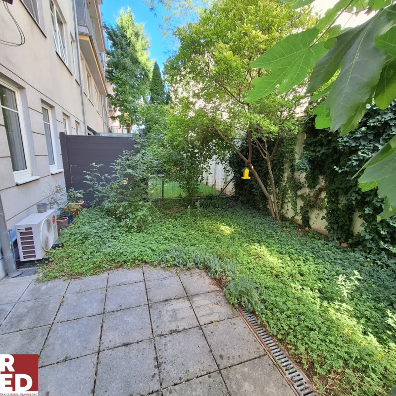 Schattige  Souterrainwohnung mit kleinen Eigengarten - Bild 1