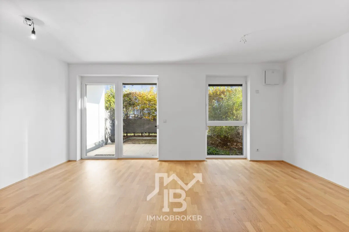Moderne, großzügige Gartenwohnung mit Tiefgaragen-Stellplatz - Bild 1
