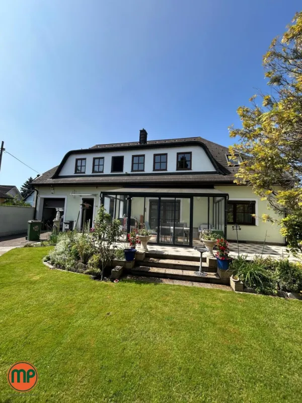 Ein Zuhause am Wasser: Haus mit Garten und bestehendem Wohnrecht an der Neuen Donau - Bild 1