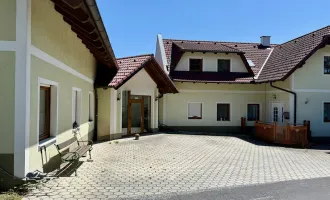 Idyllisches Mehrfamilienhaus mit Werkstatt und Nebengebäuden