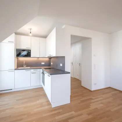 Großzügige 3-Zimmer-Dachgeschosswohnung mit Balkon & Terrasse – Südwest-Ausrichtung - Nähe Kagran / Donauzentrum - Bild 3