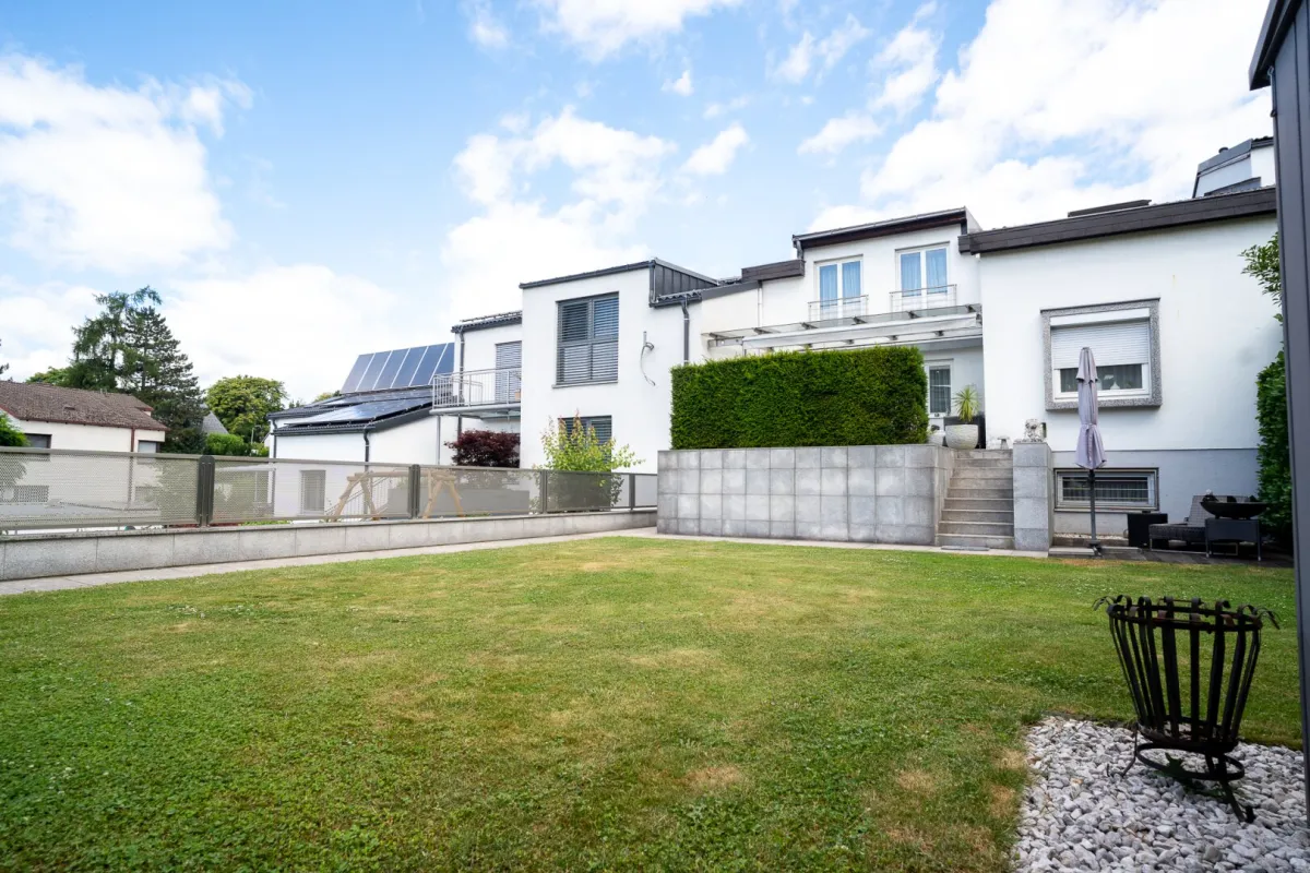 Ihr Rückzugsort in der Stadt – stilvolles Reihenhaus mit Garten - Bild 1