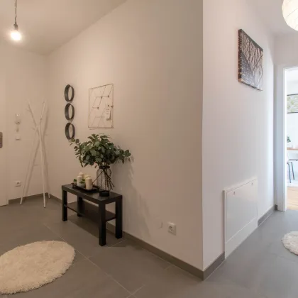 Erstbezug in Reichenau: Traumhafte 3-Zimmer-Wohnung mit Loggia & Garage! - Bild 3