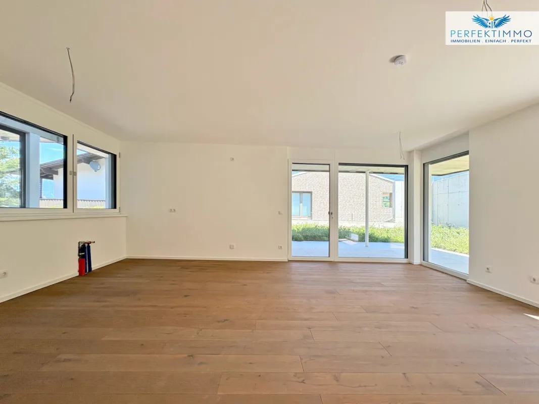 Erstklassiger Neubau: 3-Zimmer-Wohnung Top 1 mit Terrasse und Garten - Bild 1