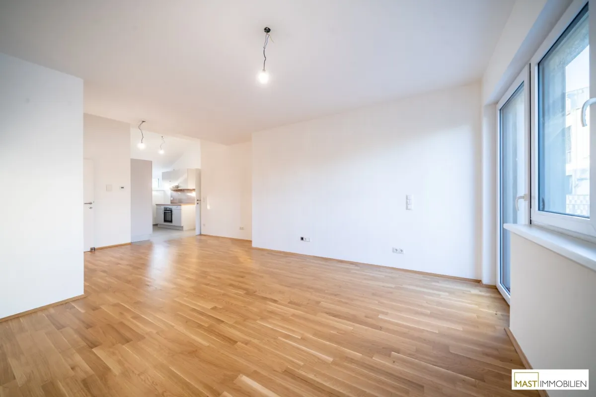 Lichterfüllter 3-Zimmer-Traum mit Balkon, teils hohen Decken & charmanten Schrägen in Breitenlee - Bild 1