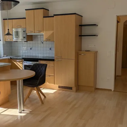 Charmante 2-Zimmer-Wohnung in Villach: Balkon, Garage & top Ausstattung zum Kauf! - Bild 2