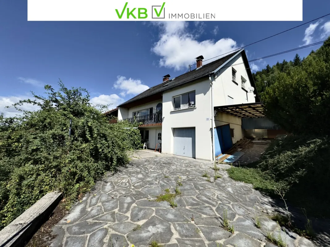 SCHLÜßLBERG | STRAßFELD: Idyllisches Zweifamilienhaus mit großzügigem, sonnigem Garten und beeindruckendem Fernblick! - Bild 1