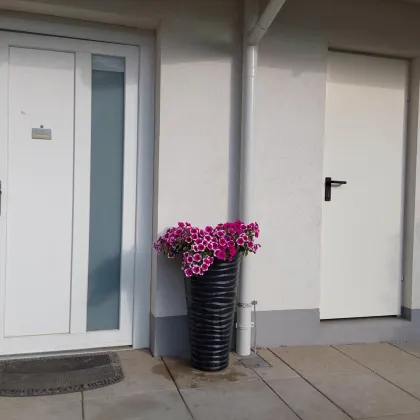 Traumhafte Gartenwohnung in Vösendorf: 81m², Terrasse, Stellplatz und sitzen in Grünen! - Bild 2