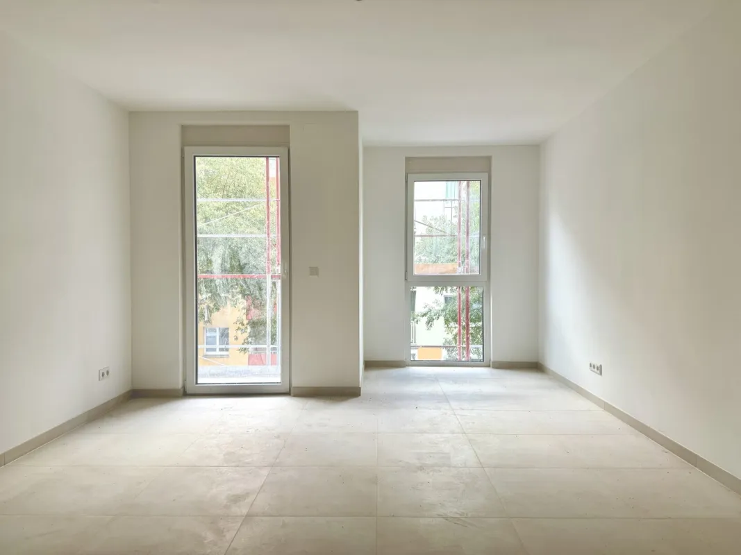 ERSTBEZUG in modernen NEUBAU mit FREIFLÄCHEN! - Bild 1