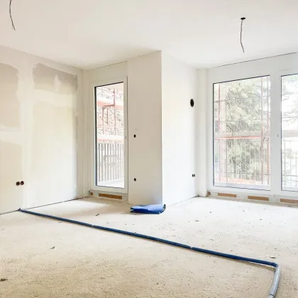 URBAN°11 - ERSTBEZUG - EXKLUSIVE NEUBAUWOHNUNGEN - MODERNES DESIGN - FREIFLÄCHEN - LICHTDURCHFLUTET - LUFTWÄRMEPUMPE - ENERGIEEFFIZIENT - U3 ENKPLATZ - 11.BEZIRK - Bild 2