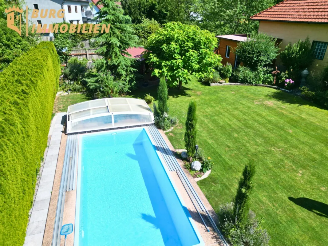 Wohnen mit Mehrwert – großzügiger Gemeinschaftsgarten mit Pool inklusive - Bild 1