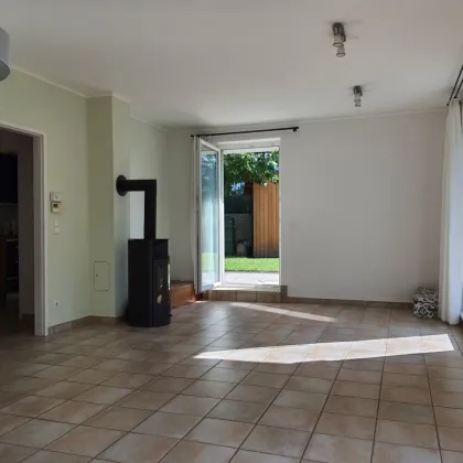Sonnige Neubauwohnung mit Eigengarten und vollausgebautem Wohnkeller - Bild 2