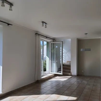 Sonnige Neubauwohnung mit Eigengarten und vollausgebautem Wohnkeller - Bild 3