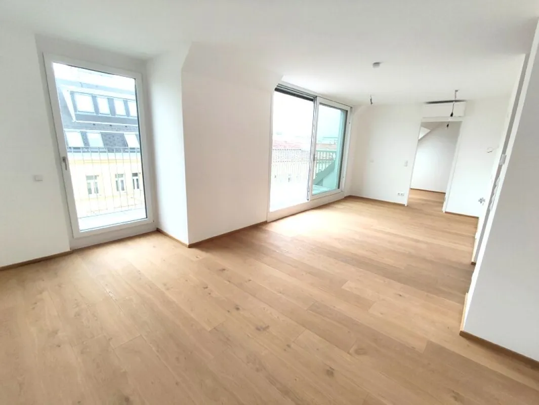 Modern wohnen in Meidling! DG-2-Zimmer-Erstbezug mit Sonnenterrasse - Top70 - Bild 1
