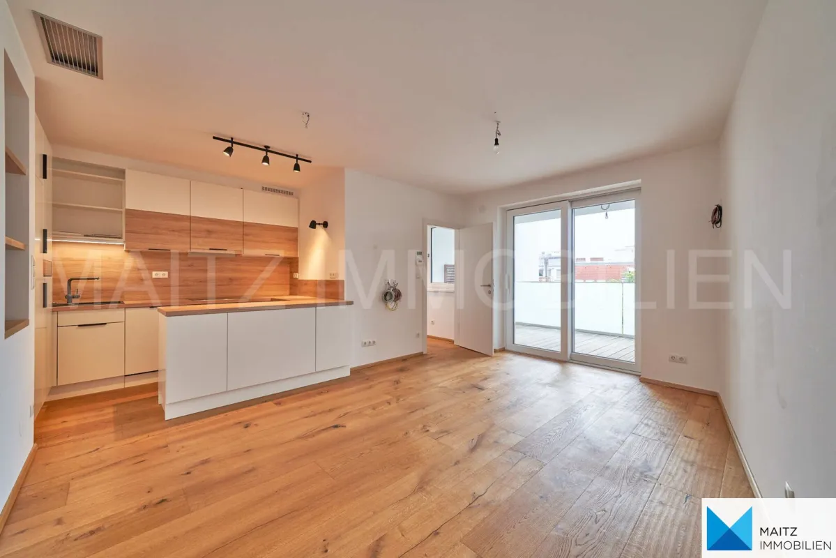 WEIT ÜBER STANDARD! Energieeffiziente, klimatisierte DG-Wohnung mit XL-Loggia. **hofseitiger Grünblick** nahe U4 - Bild 1