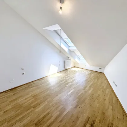 Traumhafte DG-Wohnung mit Terrasse und wunderbarem Ausblick - Nähe U3 - Bild 2