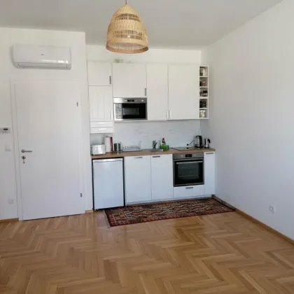 Bbefristet vermietete und klimatisierte 2-Zimmer-Wohnung mit hofeseitiger Terrasse mit opt. Garagenstellplatz! - Bild 3