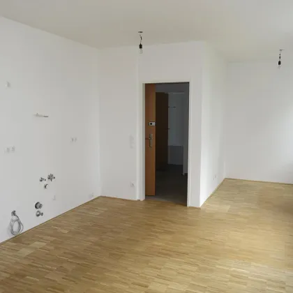 Schöne Gartenwohnung mit Tiefgaragenplatz - Bild 2