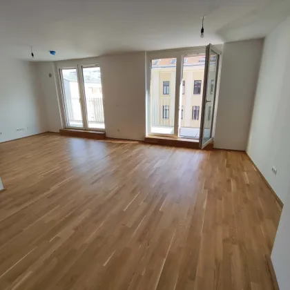 TOP NEUBAU 3-Zimmer-ERSTBEZUG mit Terrasse im 4. OG in 1210 Wien! Top 1/27 - Bild 2