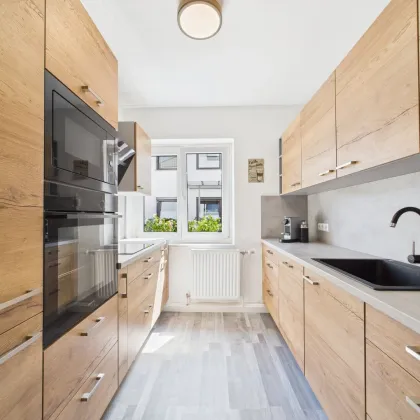 Entzückende renovierte Garten-Wohnung mit großzügiger Terrasse - Bild 2