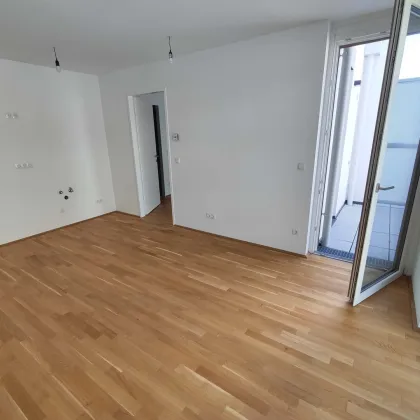 TOP NEUBAU 2-Zimmer-ERSTBEZUG mit Balkon im 4. OG in 1210 Wien! Top 1/30 - Bild 2