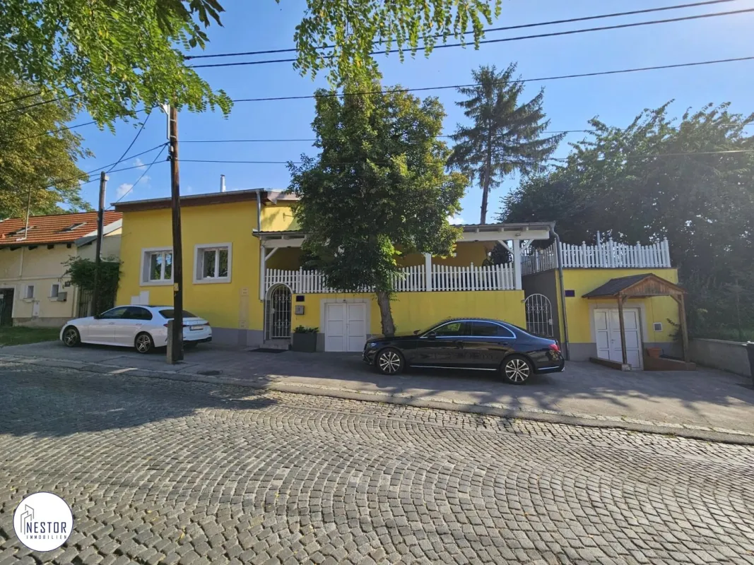 Exklusives Einfamilienhaus mit beheizbarem Weinkeller – Wohnen mit Stil und Komfort - Bild 1