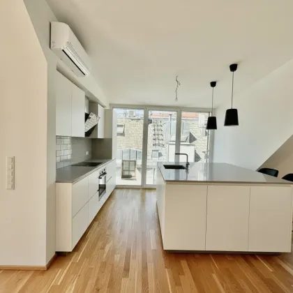 BELGHOFERHAUS 42 - Exklusive 3-Zimmer Penthousewohnung mit direktem Liftzugang und Klimageräten sowie eigener Dachterrasse - Bild 2