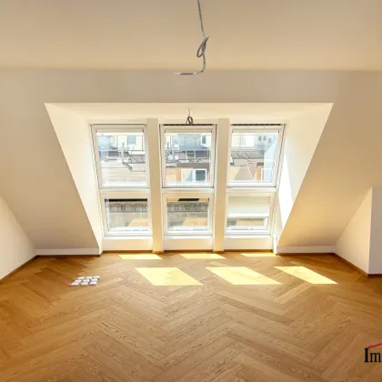 PROVISIONSFREI - ERSTBEZUG - Exklusive Dachgeschossmaisonette mit 2 Freiflächen und Deckenkühlung in RUHELAGE! - Bild 2