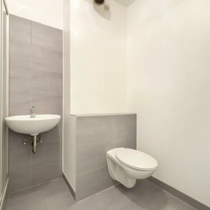 Solide investieren: vermietete 1-Zimmer-Anlegerwohnung & Tiefgaragenplatz mit 4,4% Rendite - Bild 3