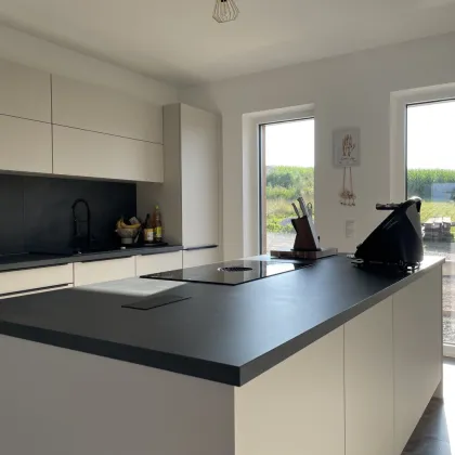 Hochwertiges Traumhaus mit lichtdurchfluteten Räumen und Wohlfühlcharakter - Bild 2