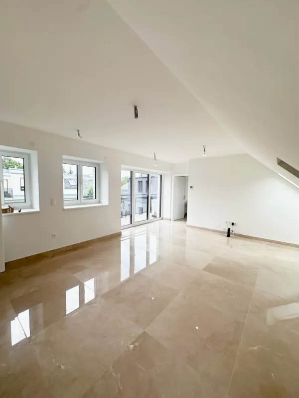 ERSTBEZUG Dachgeschoßwohnung mit Balkon in Stammersdorf  - Winzergefühl im Sehnsuchtsort der Wiener - 1210 Wien - Bild 1