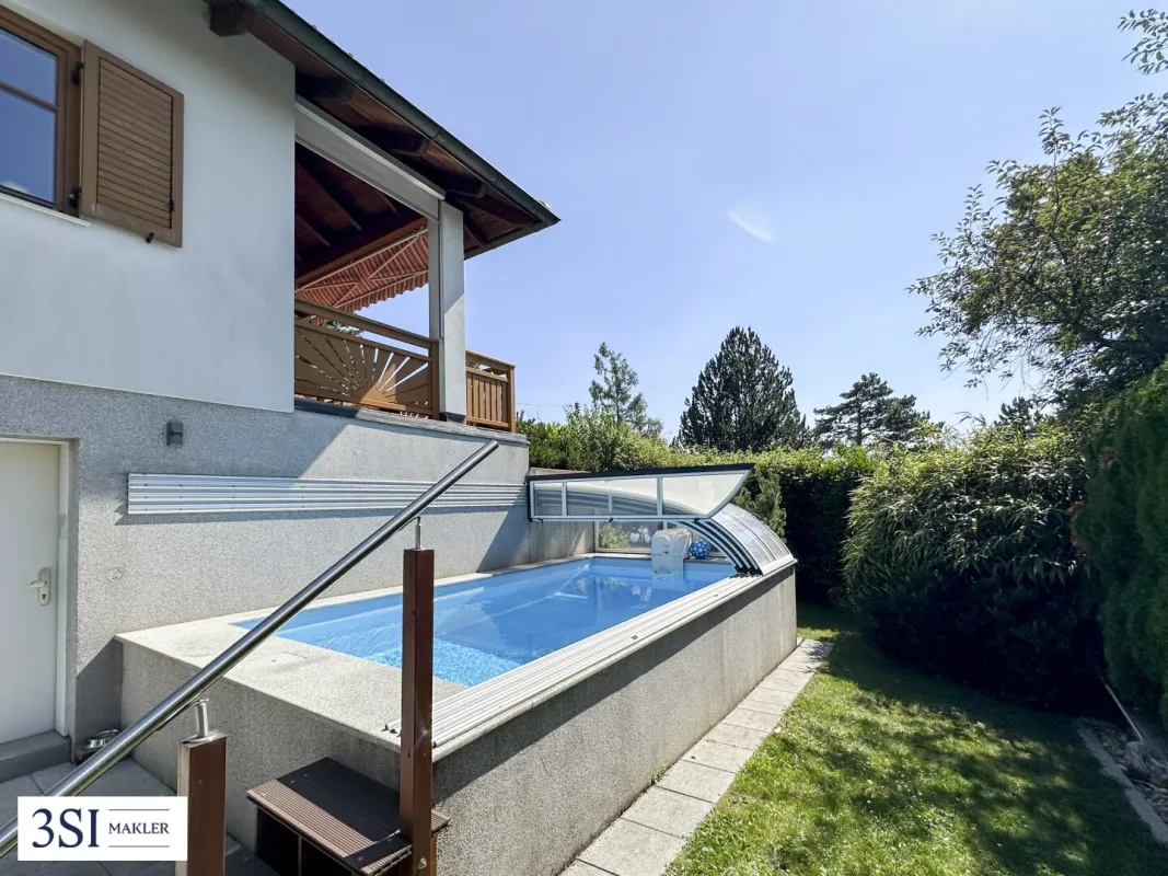 Traumhaftes Wohnen: Bungalow mit Pool & zusätzlichem Grundstück - Bild 1