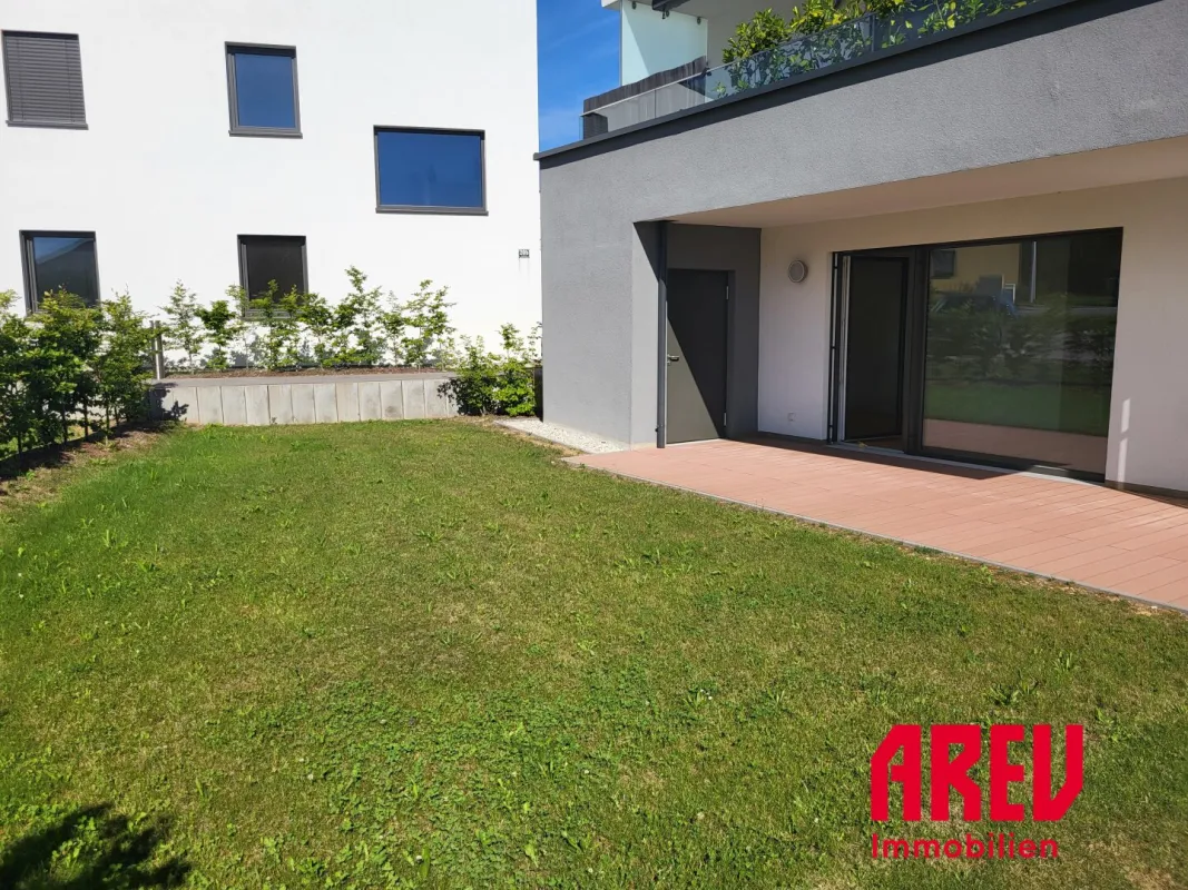 Sonnige 3-Zimmer-Neubauwohnung mit gemütlichen Eigengarten - Bild 1
