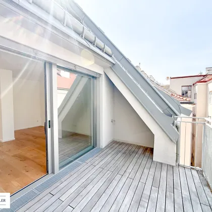 Eleganz & Komfort – moderne Dachgeschosswohnung mit Balkon & Premium-Design - Bild 2