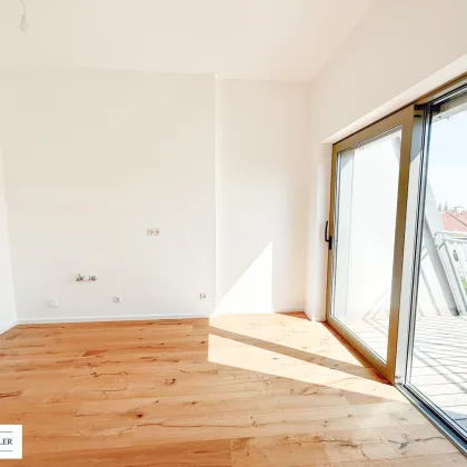 Leben mit Freiraum – Dachgeschosswohnung mit sonniger Terrasse & edler Ausstattung - Bild 3