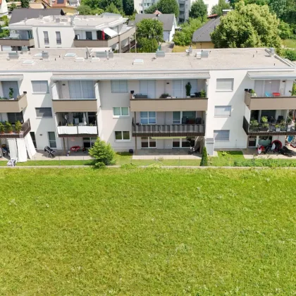 VERKAUFT: Moderne lichtdurchflutete 3 Zimmer-Gartenwohnung inkl. Tiefgaragenstellplatz & hochwertiger DAN-Küche! - Bild 2
