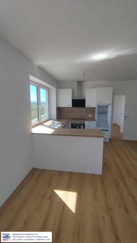 Erstbezug nach Renovierung: 2-Zimmer Wohnung in Ennsdorf mit neuer Küche & Gartenmitbenützung - Bild 1