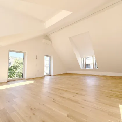 Moderne Dachgeschosswohnung mit hochwertiger Ausstattung und zentraler Lage - Bild 2
