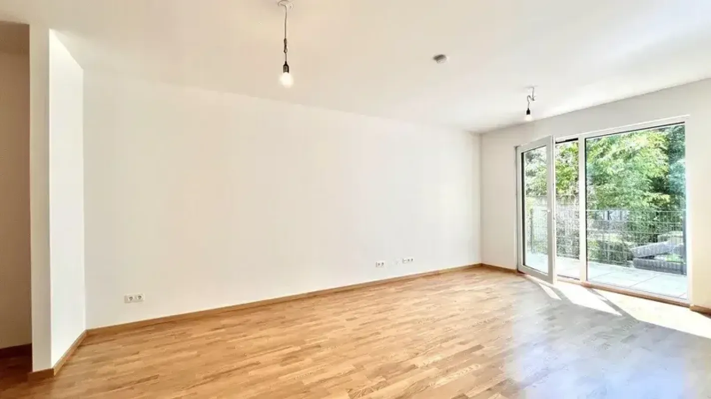 Exklusive 3-Zimmer-Terrassenwohnung mit eigenem Gartenanteil - Bild 1